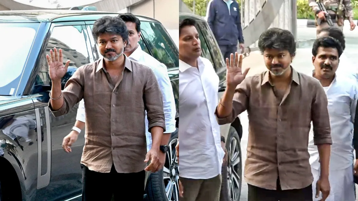 Thalapathy Vijay welcomes fans as he leaves the CBI office in the Karur stampede row amid the Jana Nayagan controversy.